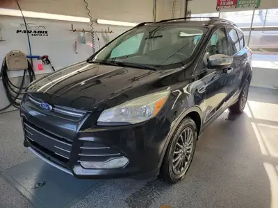 4WD -- TOIT OUVRANT -- NAVIGATION -- CAMÉRA -- SIEGES CHAUFFANTS -- MAGS -- A/C -- CRUISE -- BLUETOO...