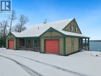 More than an acre of lakefront on Francois Lake, this private property offers the perfect blend of s...