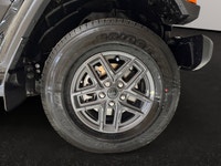 This 2026 JEEP GLADIATOR SPORT 4X4 has the following options Cloth Low-Back Bucket Seats, Uconnect 5... (image 8)