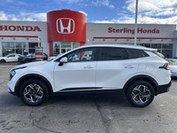 Awarded an IIHS Top Safety Pick, the 2023 Kia Sportage LX in striking Snow White Pearl ensures peace... (image 7)