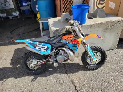 This wicked little 2-stroke motocross' engine has just been rebuilt! The beast is ready for the trac...