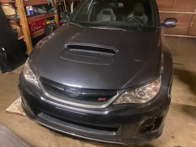 The 2014 Subaru WRX STI Tsurugi Edition is a Canadian-exclusive sedan featuring a 305-horsepower 2.5...