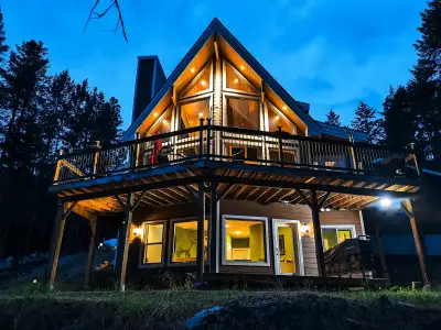 Your Lake Koocanusa Retreat — Now at a NEW PRICE with a FRESH NEW LOOK! This turnkey 4-bed, 4-bath m...