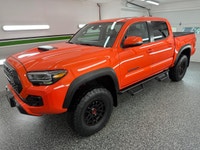 We have a RARE, SOLAR OCTANE 2023 Toyota Tacoma TRD PRO 4x4! This beast looks and drives incredible!... (image 2)