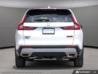 The 2026 Honda CR-V Hybrid TrailSport AWD in a stunning white finish offers unmatched versatility wi... (image 5)