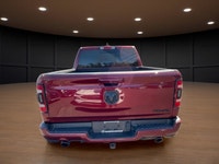Introducing the stunning red 2023 Ram 1500 Sport 4x4 Crew Cab 5'7" Box, designed to handle the road... (image 6)