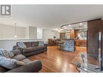 This family home includes 5 bedrooms and a bonus den in the basement, along with 2 full bathrooms wi...