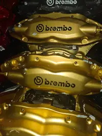 BRAND NEW Brembo  only rear brake caliper with brake pads!
