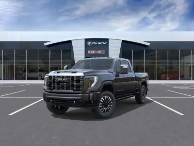 The 2026 GMC Sierra 2500HD Denali Ultimate in a refined gray finish and rugged 44 drivetrain offers...