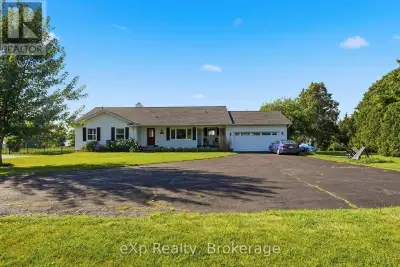 Enjoy waterfront living on the beautiful Bay of Quinte in this bright executive bungalow featuring a...