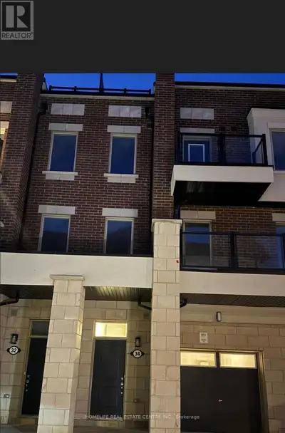 Welcome to this stunning brand new 3-storey townhouse in the highly desirable Southfields Village co...