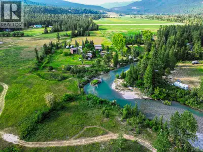 Experience the pinnacle of rural elegance with this exceptional property, where the main floor featu...