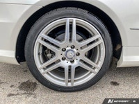 Step into elegance with this 2011 Mercedes-Benz E-Class E 550 Coupe, showcasing a crisp White exteri... (image 5)