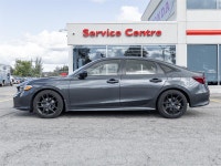 Sleek, sporty, and refined, this 2025 Honda Civic Sport CVT Sedan delivers responsive performance, m... (image 2)