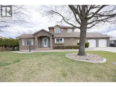 Welcome to 1563 Homestead Court, a spacious Glenmore home set on a quiet cul de sac with sweeping ci...