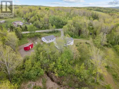 Only ten minutes from CFB Greenwood this four-bedroom three-and-a-half bath home with in-law suite,...