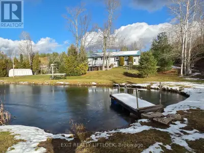 Your Private Country Retreat Awaits! Charming 3 bedroom, 2 bath raised bungalow on 8.79 peaceful acr...