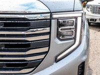 The 2023 GMC Sierra 1500 SLT Crew Cab Short Box 4-Wheel Drive in a refined gray finish offers except... (image 6)
