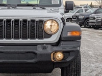 This Jeep Wrangler has a dependable Intercooled Turbo Premium Unleaded I-4 2.0 L/122 engine powering... (image 9)