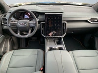 The 2026 Acadia AT4 mid-size SUV screams athletic attitude and features confident lines, eye-catchin... (image 9)
