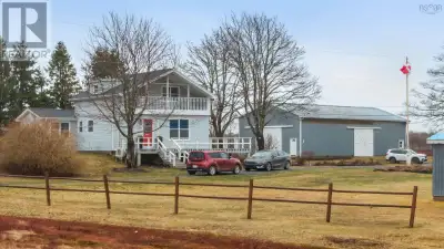 Welcome to your own private retreat on approximately 9 acres of beautifully landscaped and natural g...