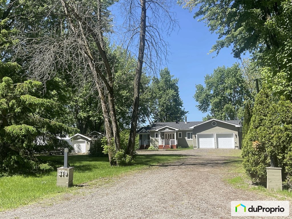 $629,000 - Bungalow for sale in St-Andre-D'Argenteuil — photo 1