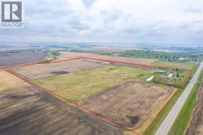 Here is a active 103.41 acre FARM that is ANNEXED into the fast growing, TOWN OF CARSTAIRS. Utilize...