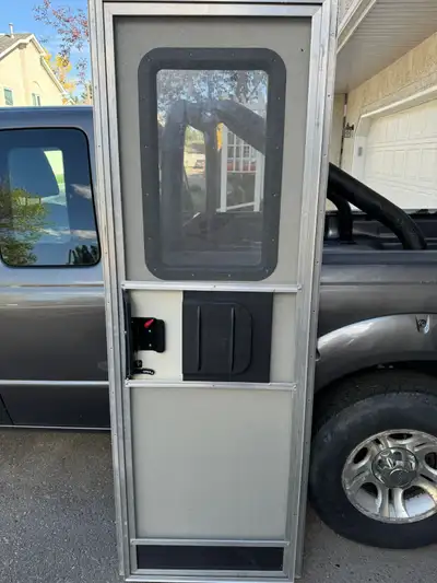 Selling a brand new rv door standard size square build inc. lock and keys for $545..00 70.5 inches t...