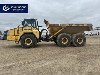 This 2012 Komatsu HM400-2 rock truck delivers powerful performance with a 443 horsepower diesel engi...