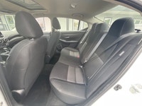 The 2023 Nissan Sentra SV CVT in pristine White is a front-wheel-drive sedan that handles beautifull... (image 7)