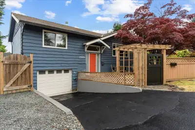 Steps to the shore in White Rock! This charming corner-lot home offers a relaxed beachside lifestyle...