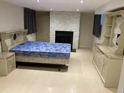 Furnished basement for a female or two females to rent a spacious private room but share kitchen and...