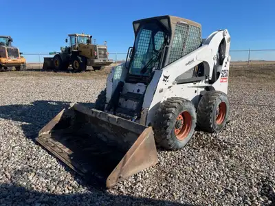 Welcome to Redhead Equipment - Construction Equipment Division Enclosed ROPS Heat/AC 74" Low Pro Buc...