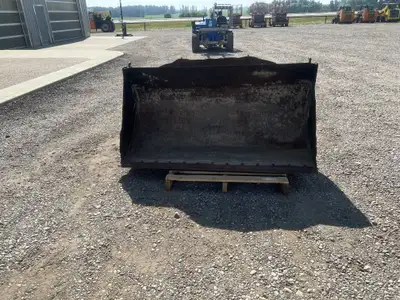 69" Smooth Telehandler Bucket - 21.5" between lugging, 11 ¾" from bottom of circle to top arch - Sto...