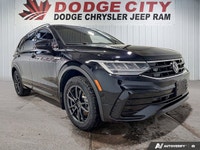 This Volkswagen Tiguan boasts a Intercooled Turbo Regular Unleaded I-4 2.0 L/121 engine powering thi... (image 7)