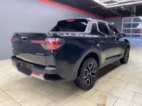 The 2023 Hyundai Santa Cruz Preferred AWD in sleek black offers an extraordinary driving experience... (image 3)