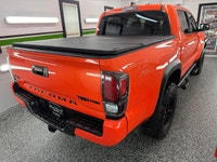 We have a RARE, SOLAR OCTANE 2023 Toyota Tacoma TRD PRO 4x4! This beast looks and drives incredible!... (image 7)