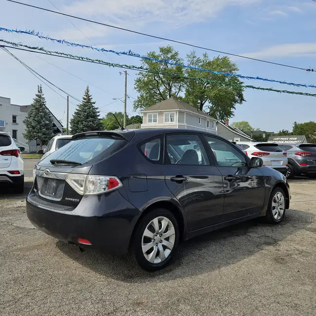 2009 Subaru Impreza 2.5i 4dr All-wheel Drive Manual in Cars & Trucks in St. Catharines - Image 5
