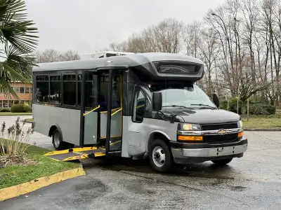This 2020 Chevrolet Express 4500 22-passenger bus comes equipped with a wheelchair ramp and accessib...