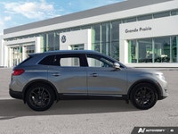 Slide into sophisticated comfort and commanding presence with the 2016 Lincoln MKX Reserve Sport Uti... (image 5)
