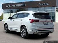 Wrapped in a stunning Quartz White, this 2022 Hyundai Santa Fe Ultimate Calligraphy offers a journey... (image 2)