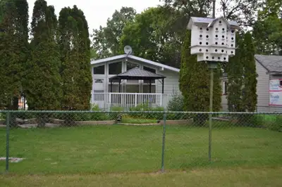 Price reduced $ 15,000 !!!, Owner says SELL !! Now 210,000. 4 bdr, 1,300 sq. ft. yr-round home in Wp...
