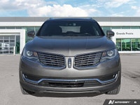 Slide into sophisticated comfort and commanding presence with the 2016 Lincoln MKX Reserve Sport Uti... (image 7)
