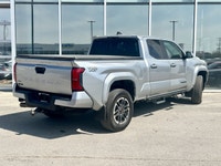 * Suspension: Red TRD sport-tuned shocks for improved on-road handling. * Exterior: 18-inch TRD allo... (image 3)