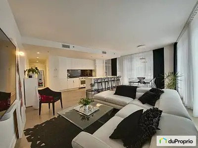 Prestigieux condo, unité de coin, offrant une abondante luminosité à la limite de Griffintown et de...