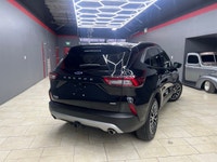 The 2024 Ford Escape in the elegant Black finish coupled with a Front-Wheel Drive system offers an e... (image 3)