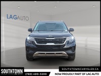 Experience the Kia Seltos LX with only 141305 km on the odometer. Finished in a sleek Black with a w... (image 1)