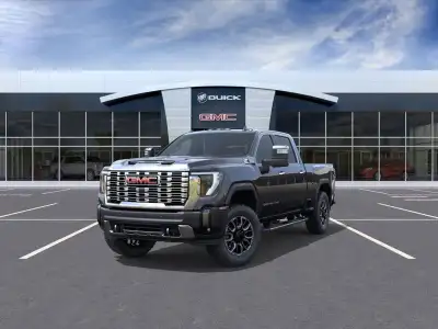 The 2026 GMC Sierra 2500HD Denali in a sophisticated gray hue, equipped with a powerful 4x4 drivetra...