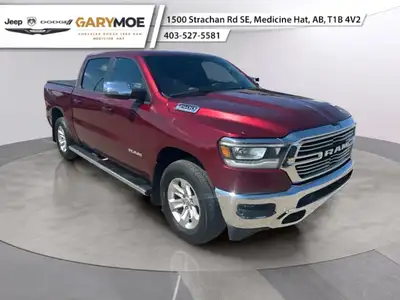 Experience the bold presence of the 2023 Ram 1500 Laramie in stunning red with the unstoppable 44 dr...