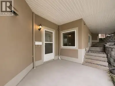 Ground-level 3-bedroom, 1-bathroom unit in a Coquitlam house with approximately 1,000 sqft of practi...